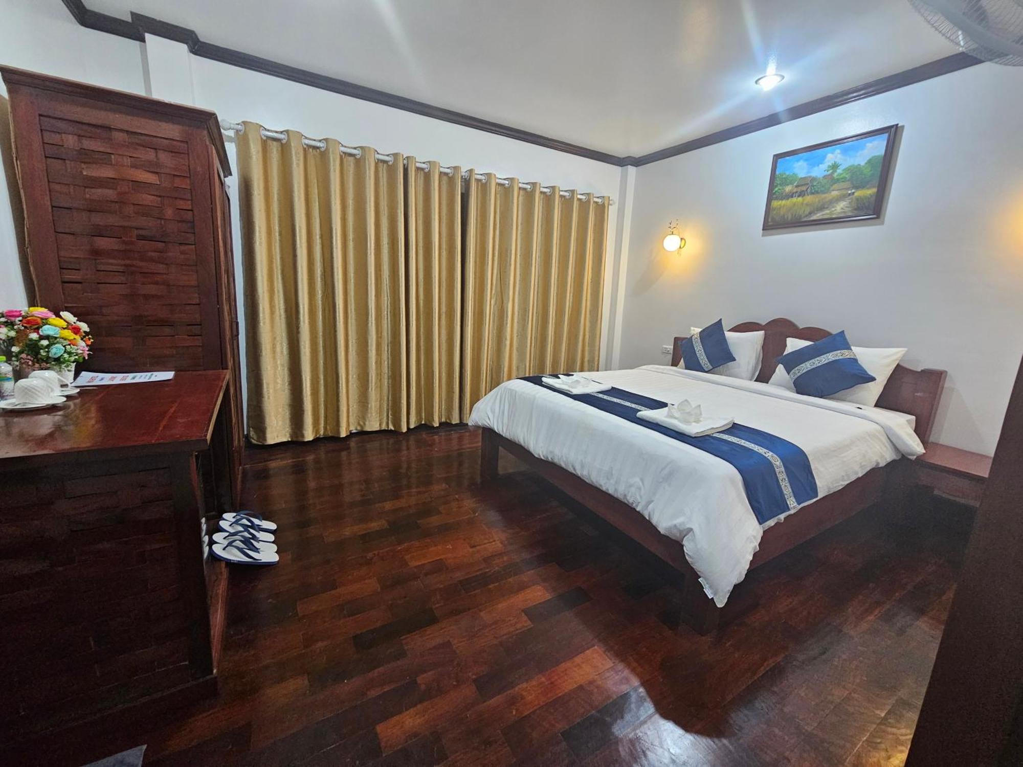 Win Hotel Vang Vieng Esterno foto