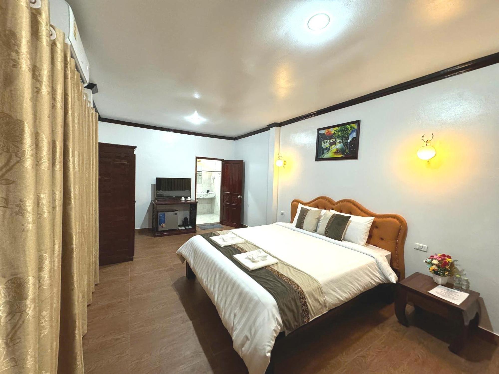 Win Hotel Vang Vieng Esterno foto