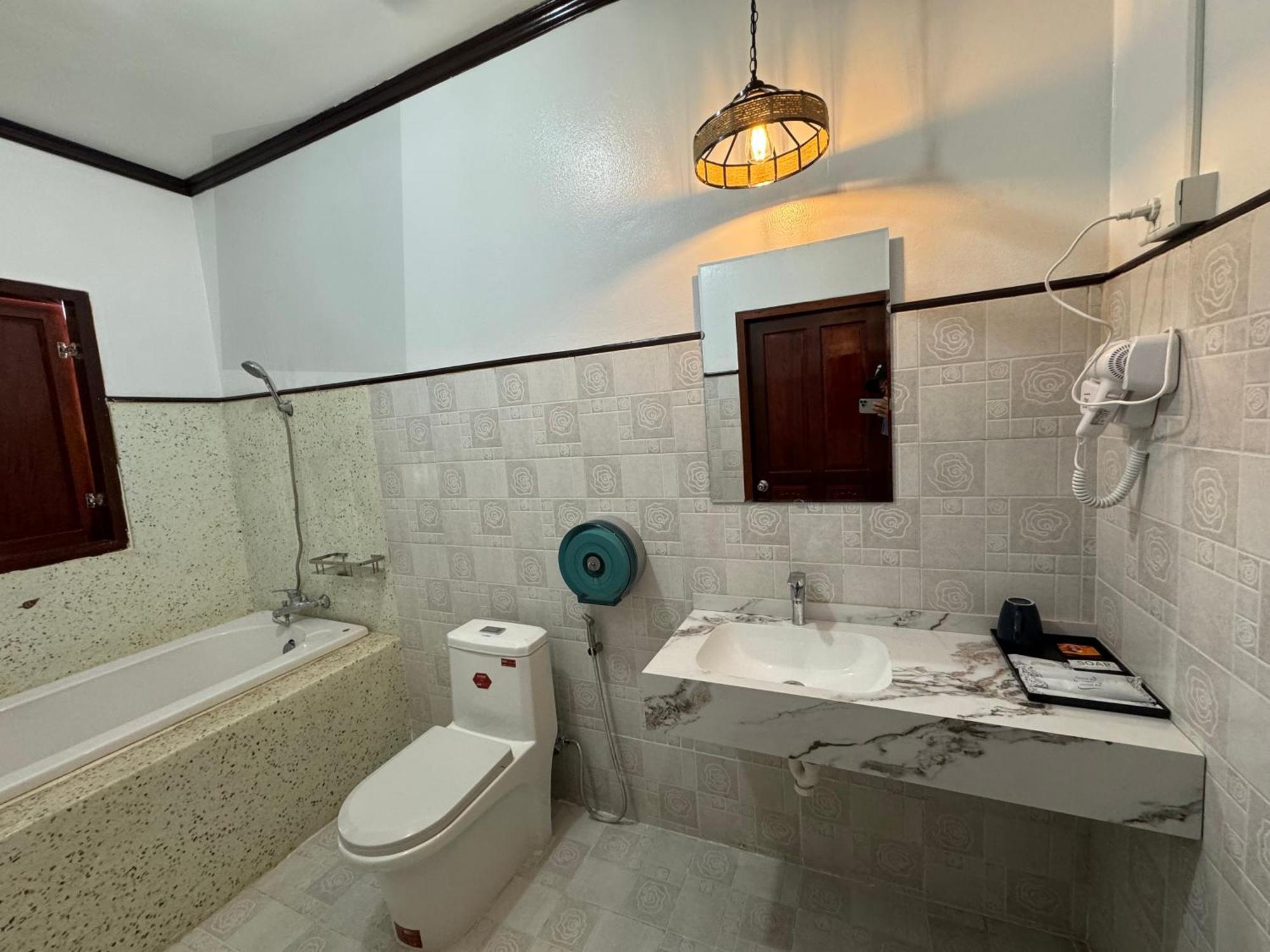 Win Hotel Vang Vieng Esterno foto