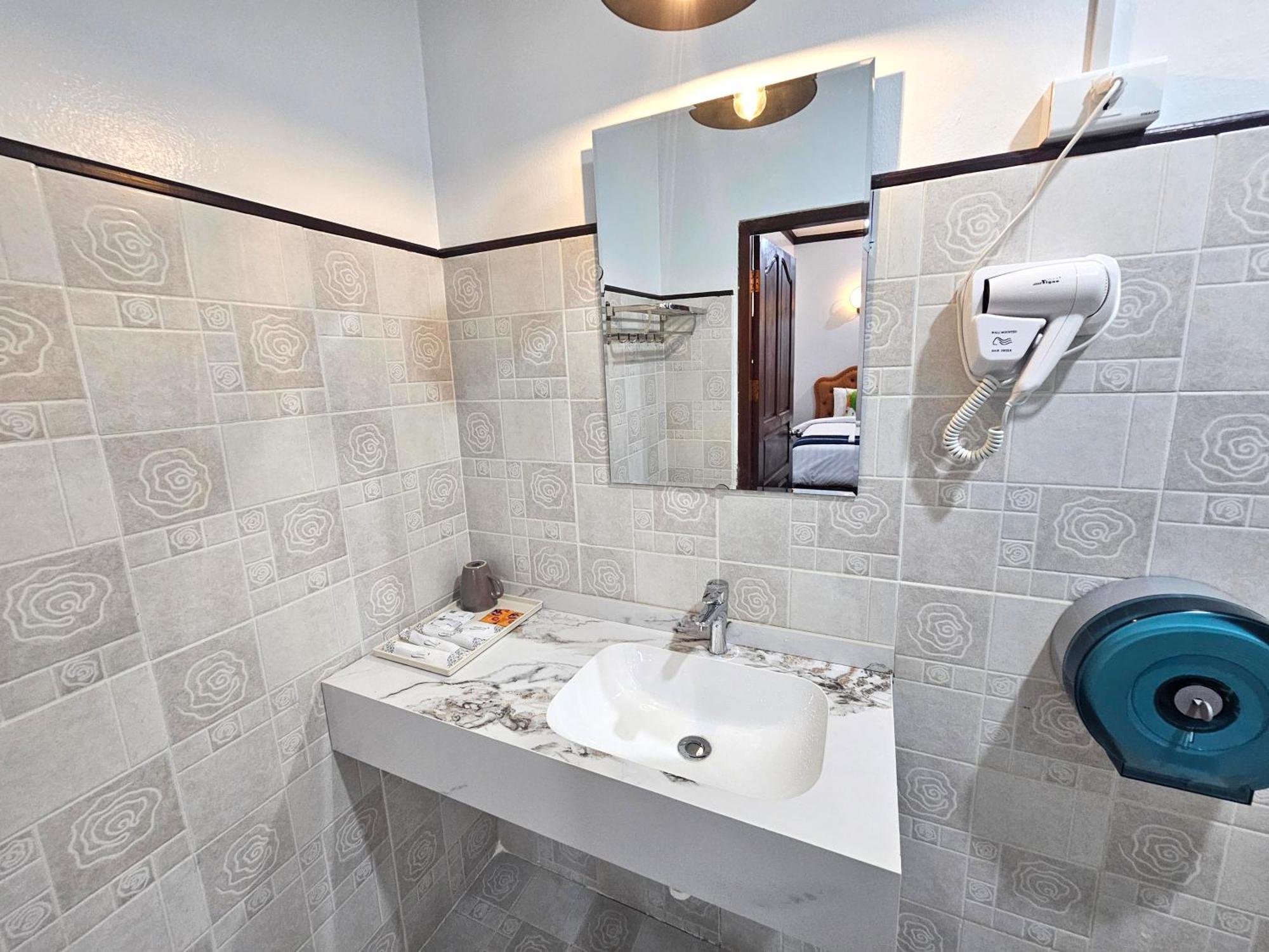 Win Hotel Vang Vieng Esterno foto
