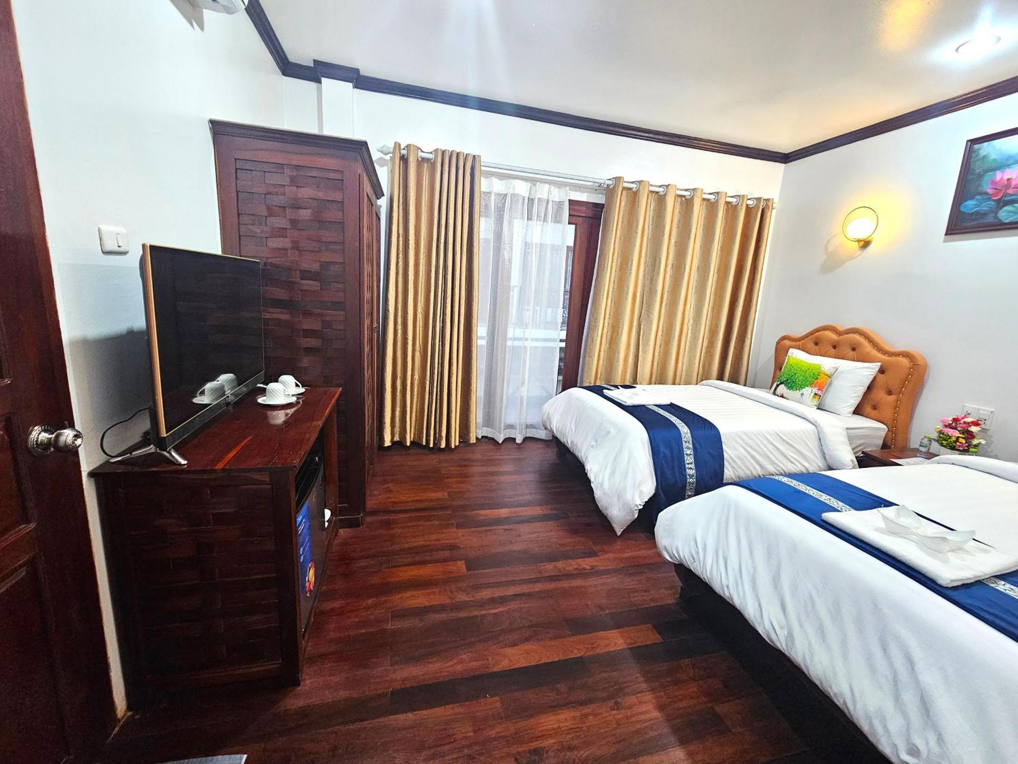 Win Hotel Vang Vieng Esterno foto