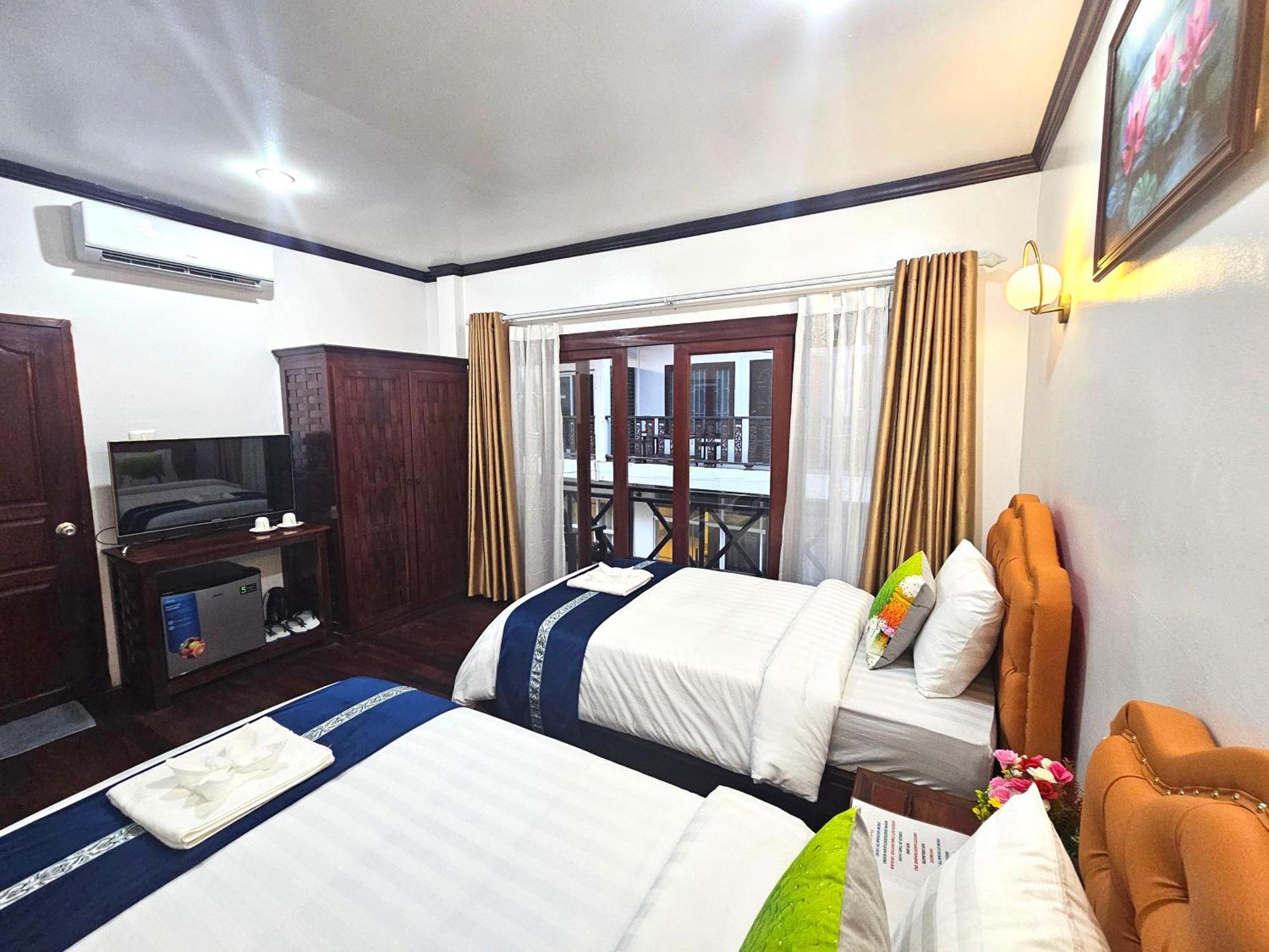 Win Hotel Vang Vieng Esterno foto