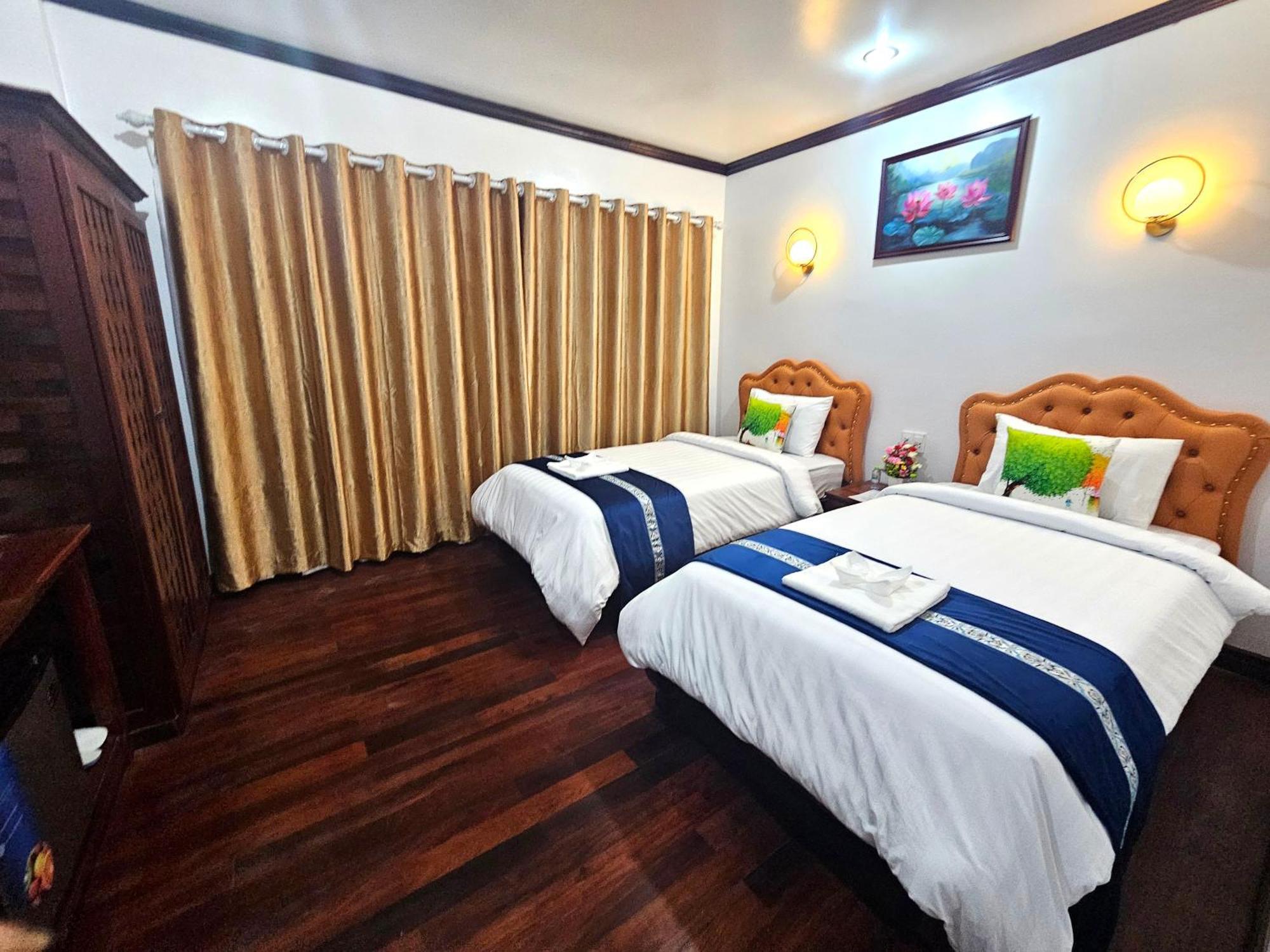 Win Hotel Vang Vieng Esterno foto