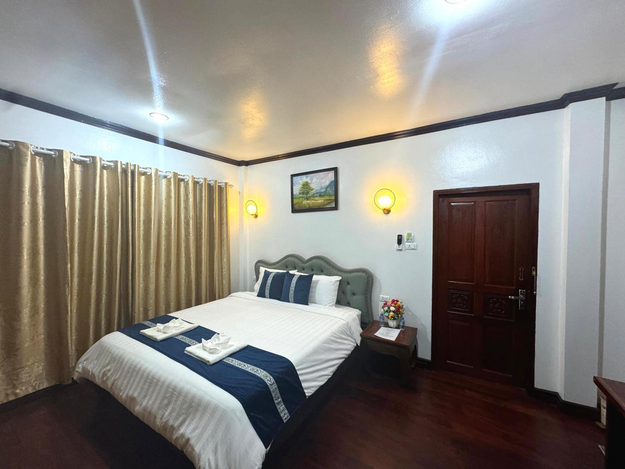 Win Hotel Vang Vieng Esterno foto
