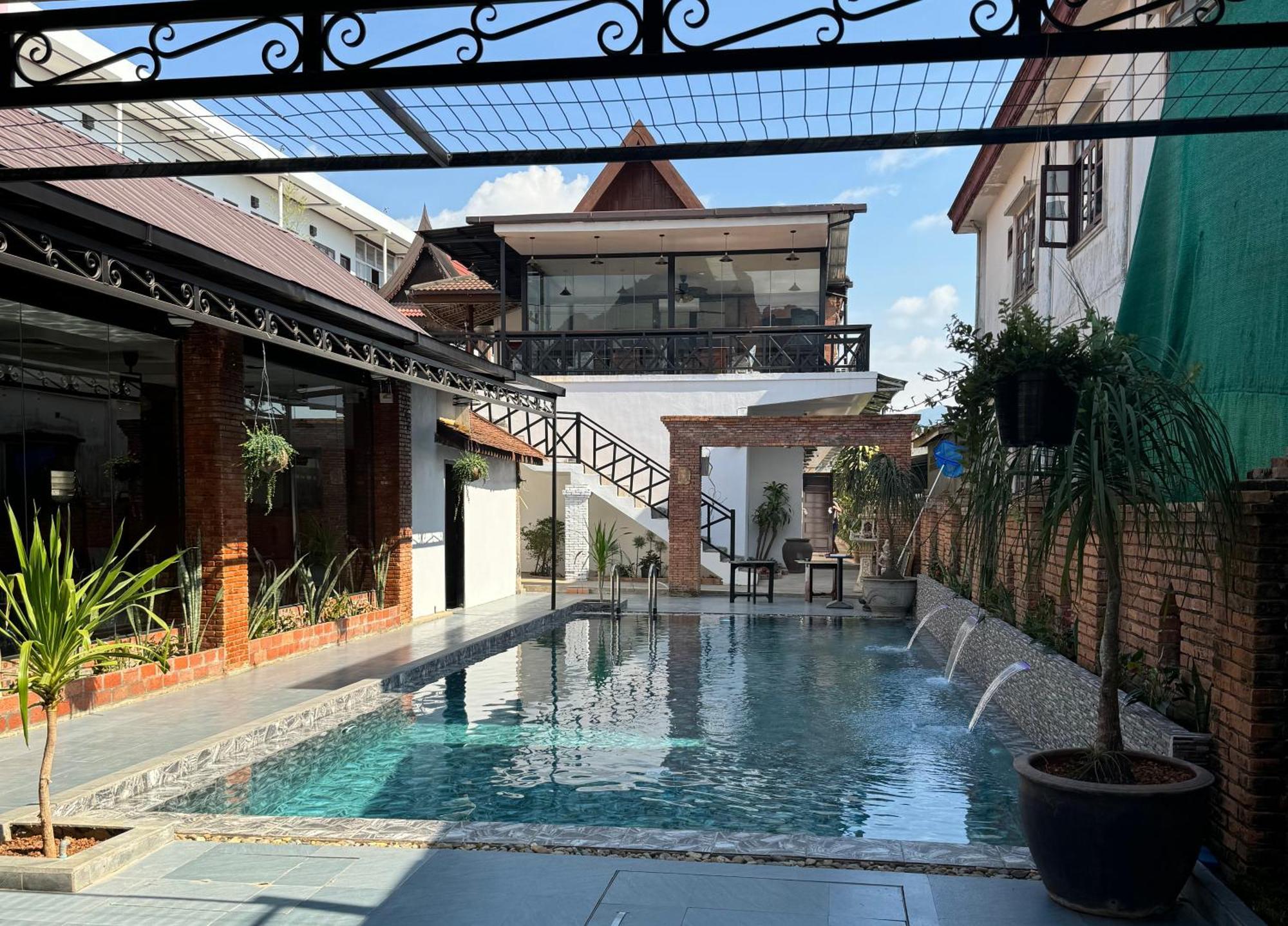Win Hotel Vang Vieng Esterno foto