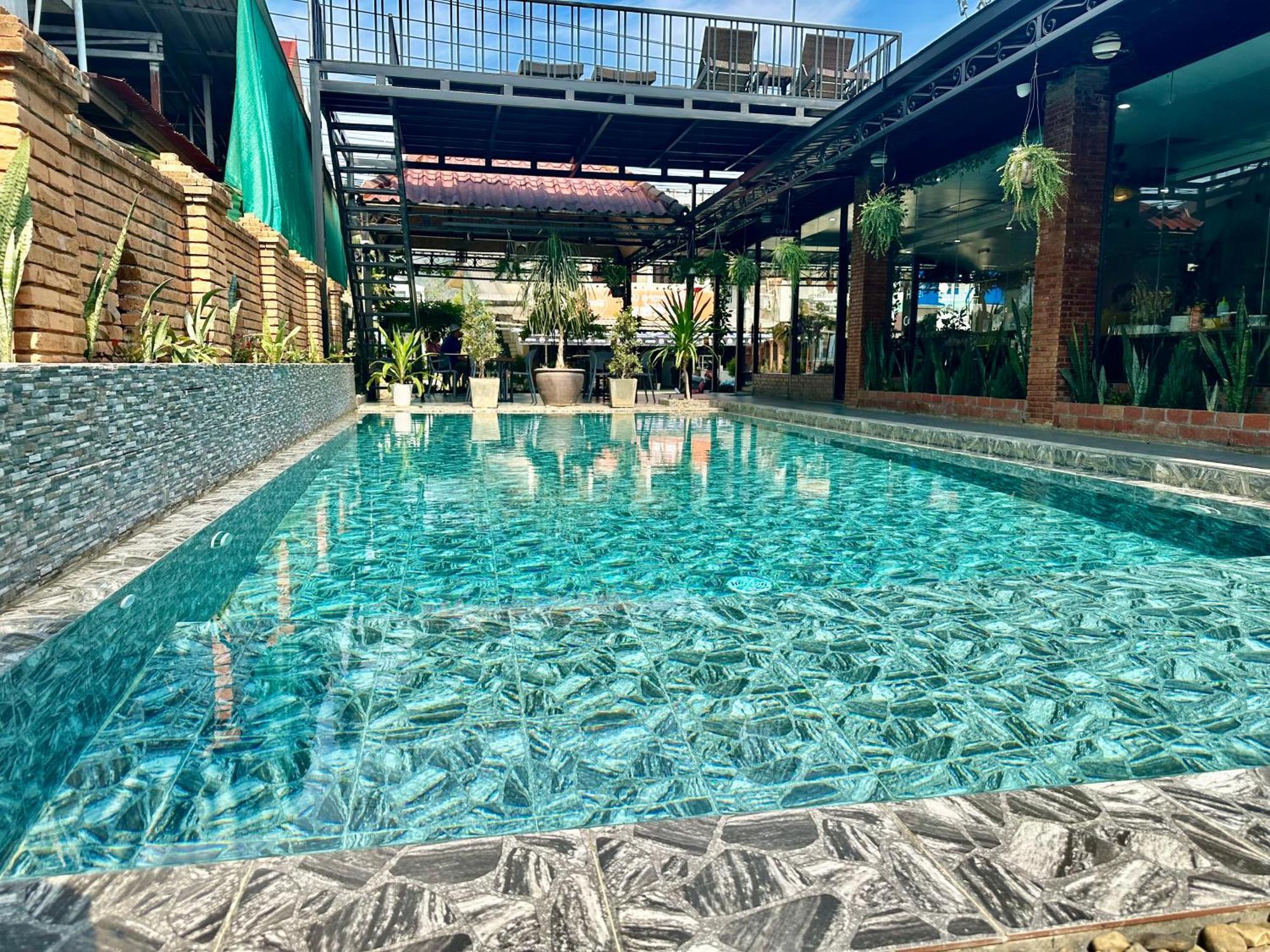 Win Hotel Vang Vieng Esterno foto